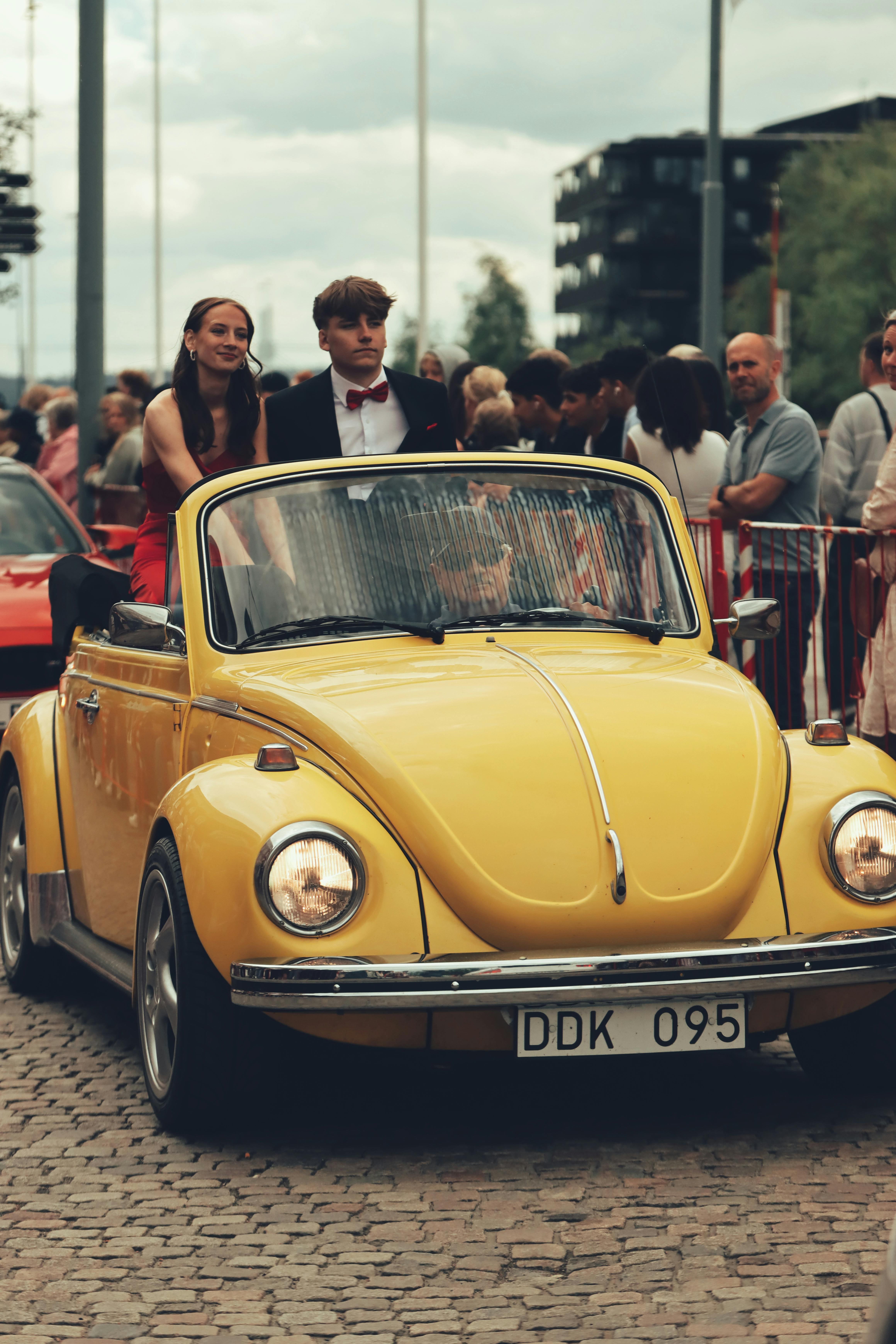 Visitors exploring the car show layout