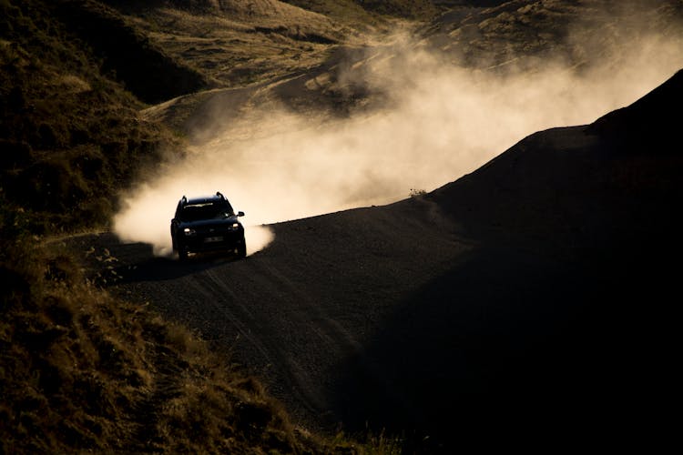 Photo Of Car On Dirt Road