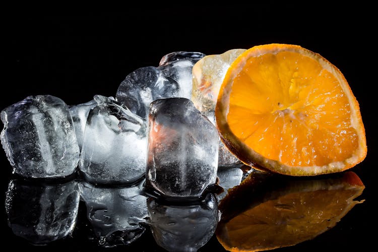 Slice Of Orange And Ice Blocks