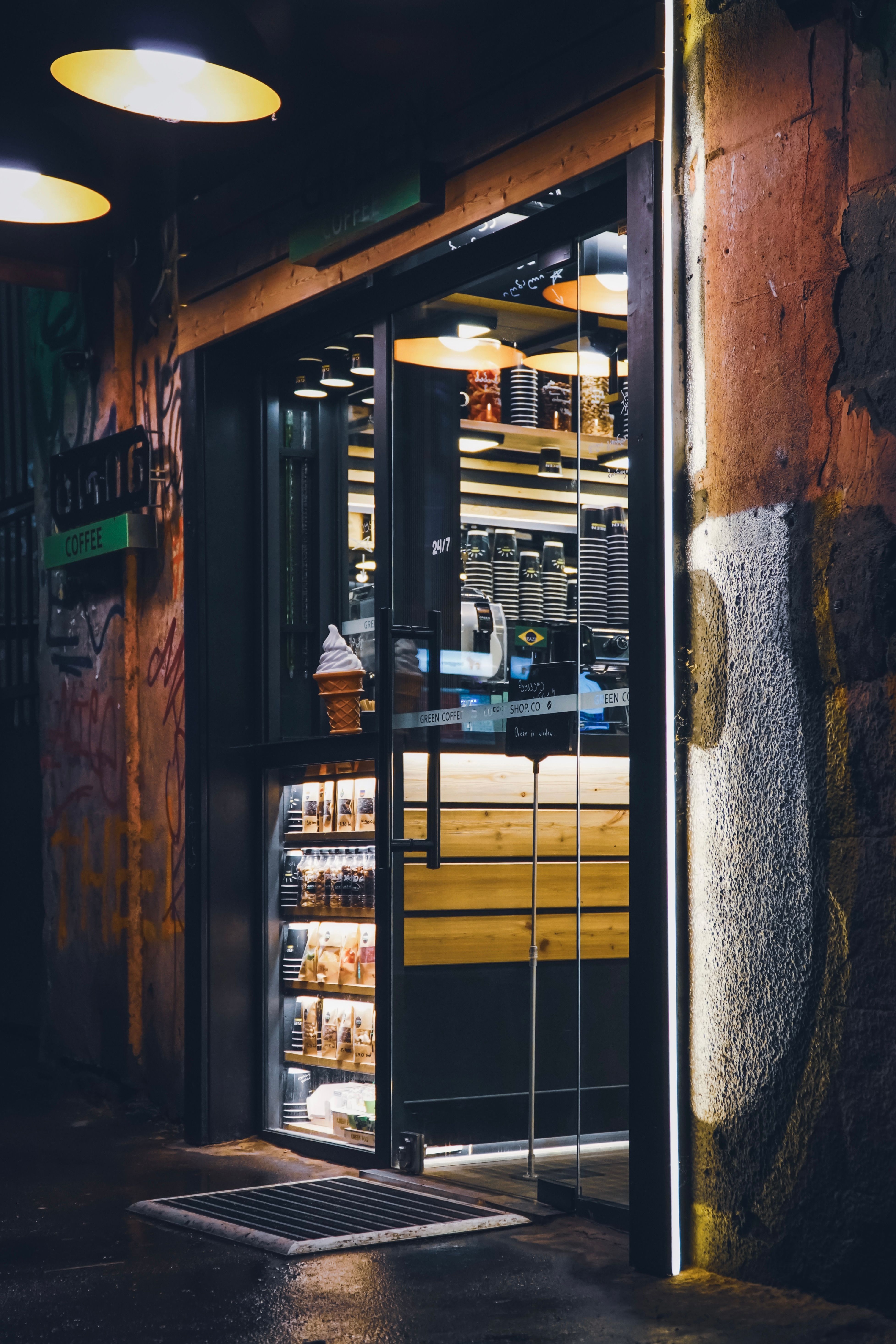 Illuminated Entrance to a Bar · Free Stock Photo