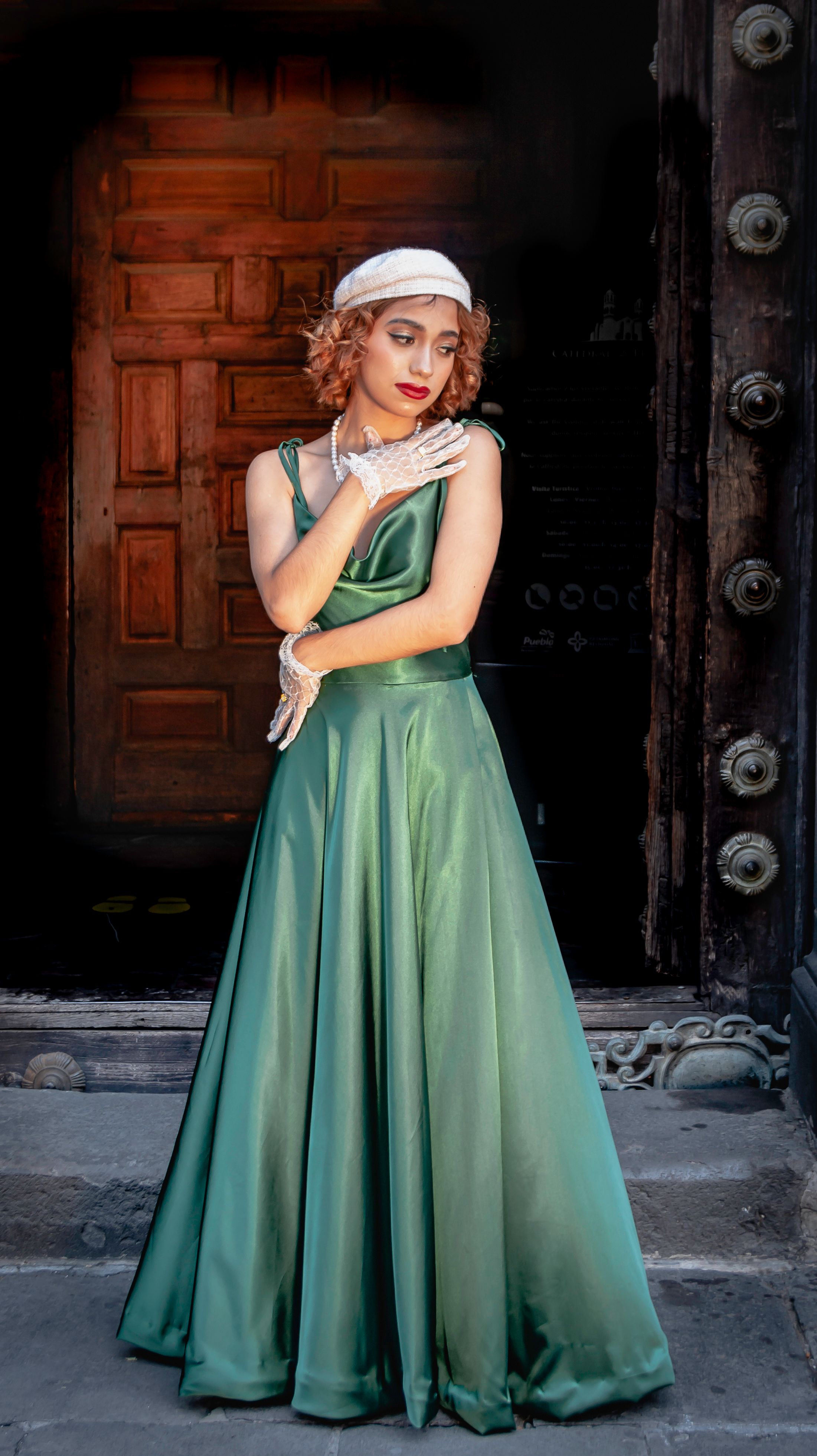 Model in Satin Green Dress and White Beret  Free Stock Photo