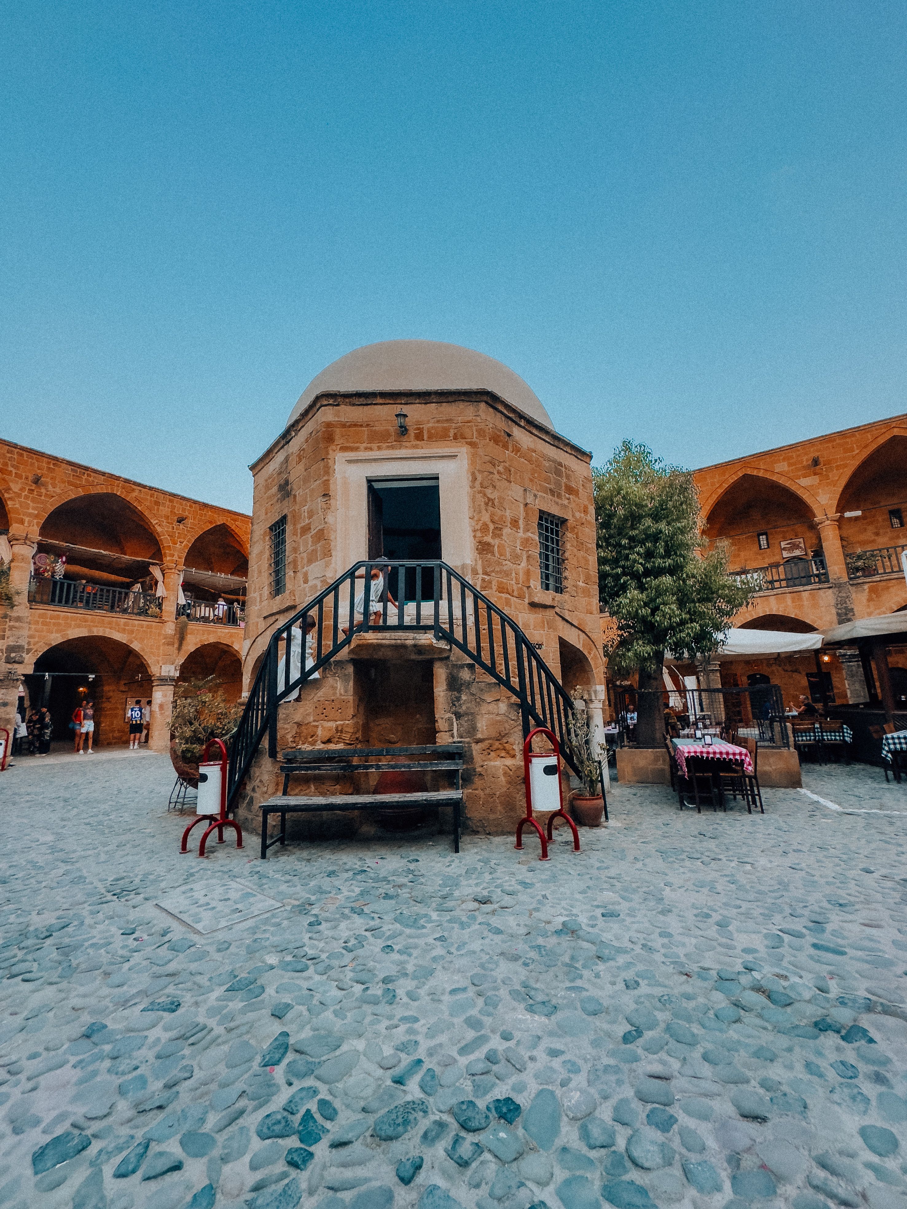 Charming view of Buyuk Han courtyard, a major landmark and tourist attraction in Cyprus.