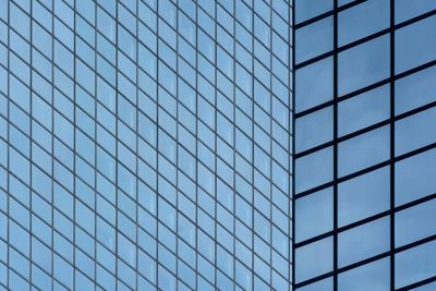 Glass office tower facade — photo by Jan van der Wolf on Pexels