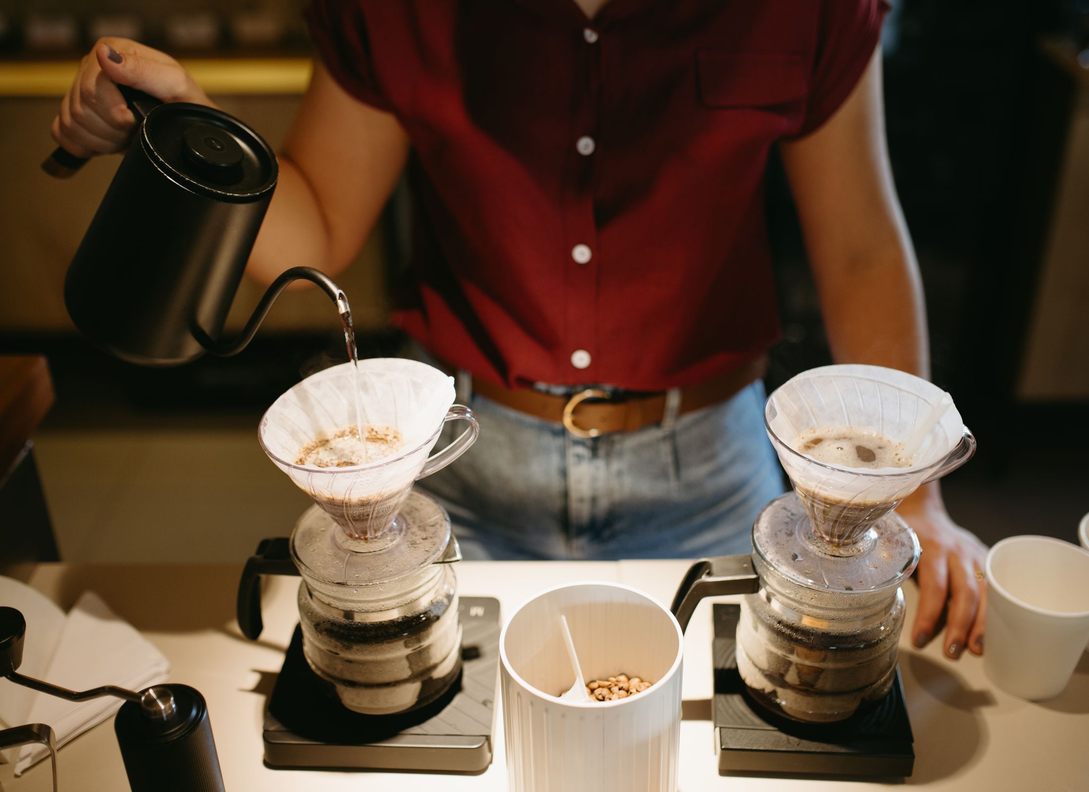 Barista making a slow pour-over coffee