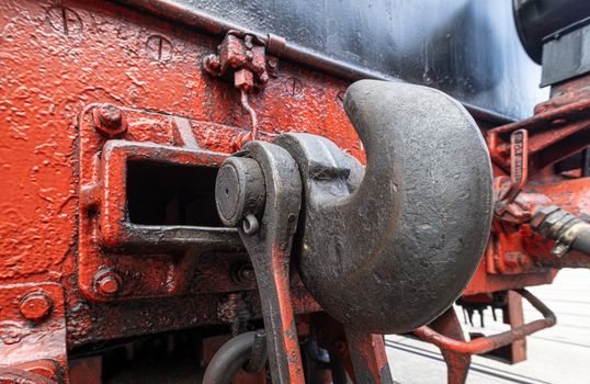 Detailed view of a vintage train coupling mechanism in Sonneberg, Germany showcasing industrial history.