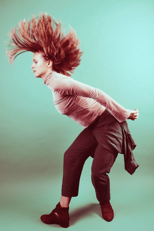 Woman Wearing Brown Pants Dancing