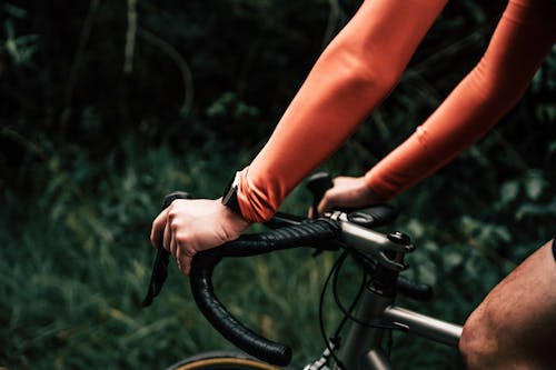 Cyclist Arms on Road Bike Handlebar