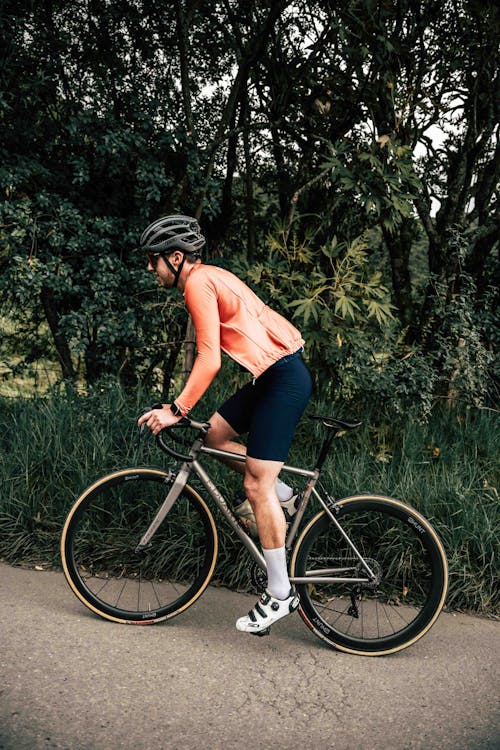 Cyclist with Helmet Riding on Bike