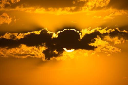 Free Sun Hiding Behind Clouds Stock Photo