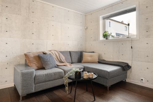 A living room with a couch and coffee table