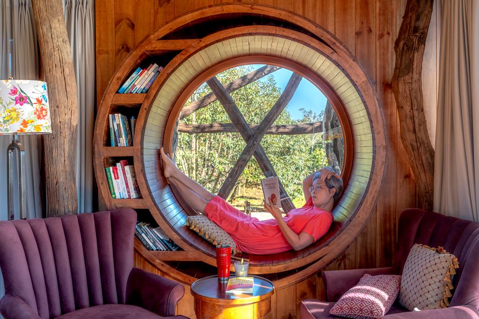 Cozy reading nook created by a high-quality bay window installation - bay window replacement Northfield Cozy reading nook created by a high-quality bay window installation - bay window replacement Northfield