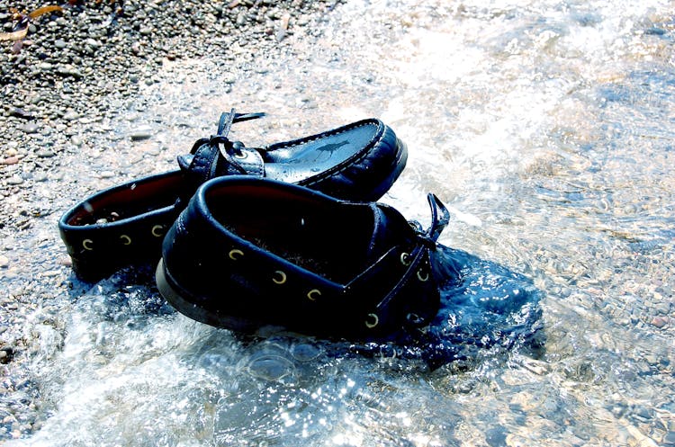 Pair Of Black Leather Boat Shoes