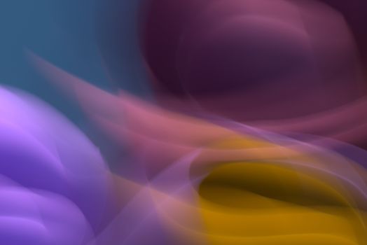 Vivid abstract image of colorful light streaks blending in motion, creating a dynamic and vibrant visual effect.