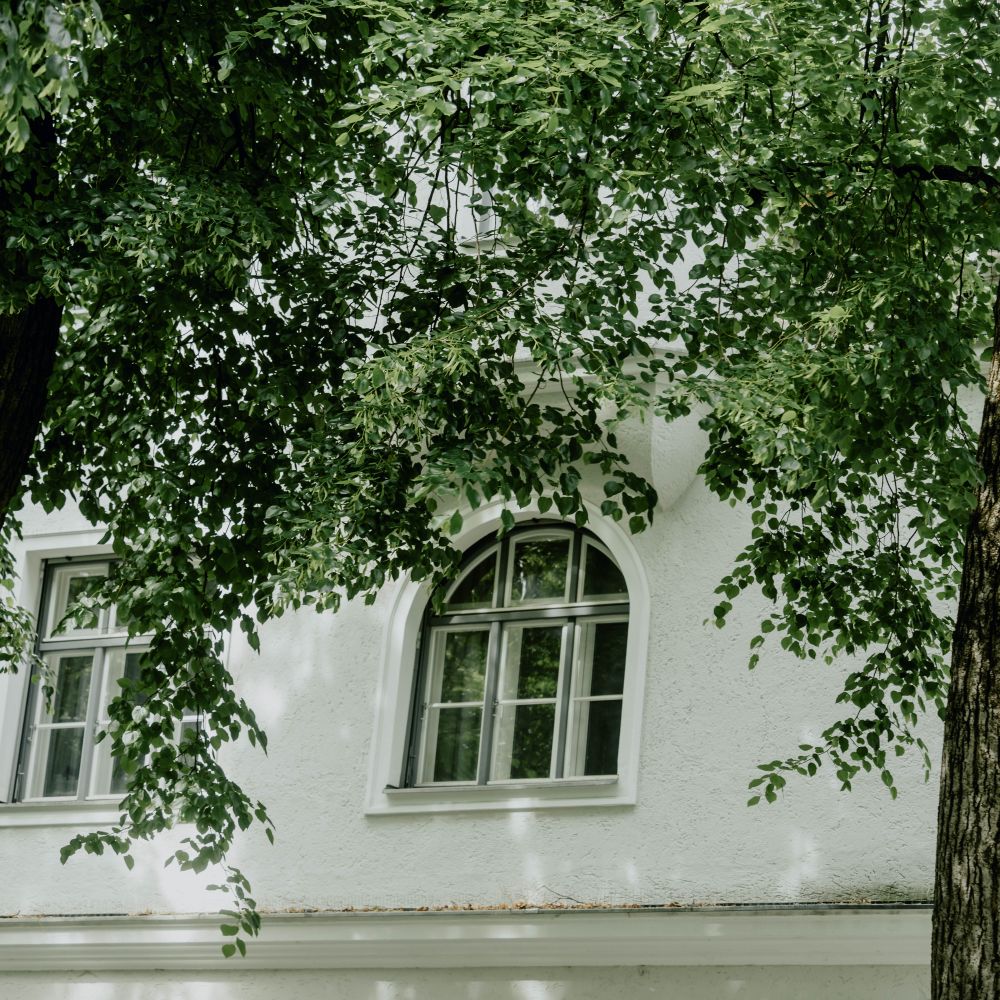 Exterior Painting in Hackney Central — careful masking before painting begins