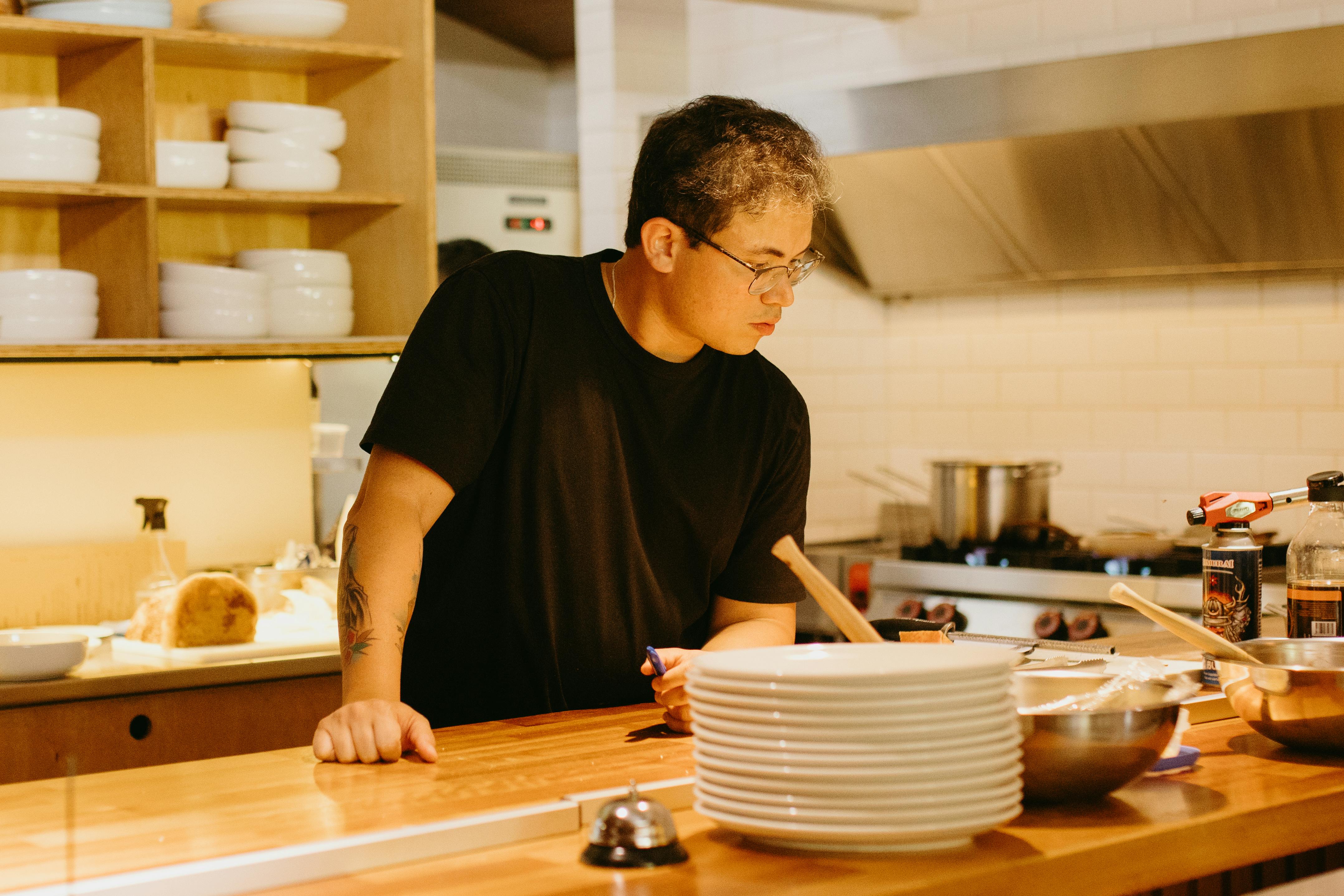 a man cooking in the kitchen