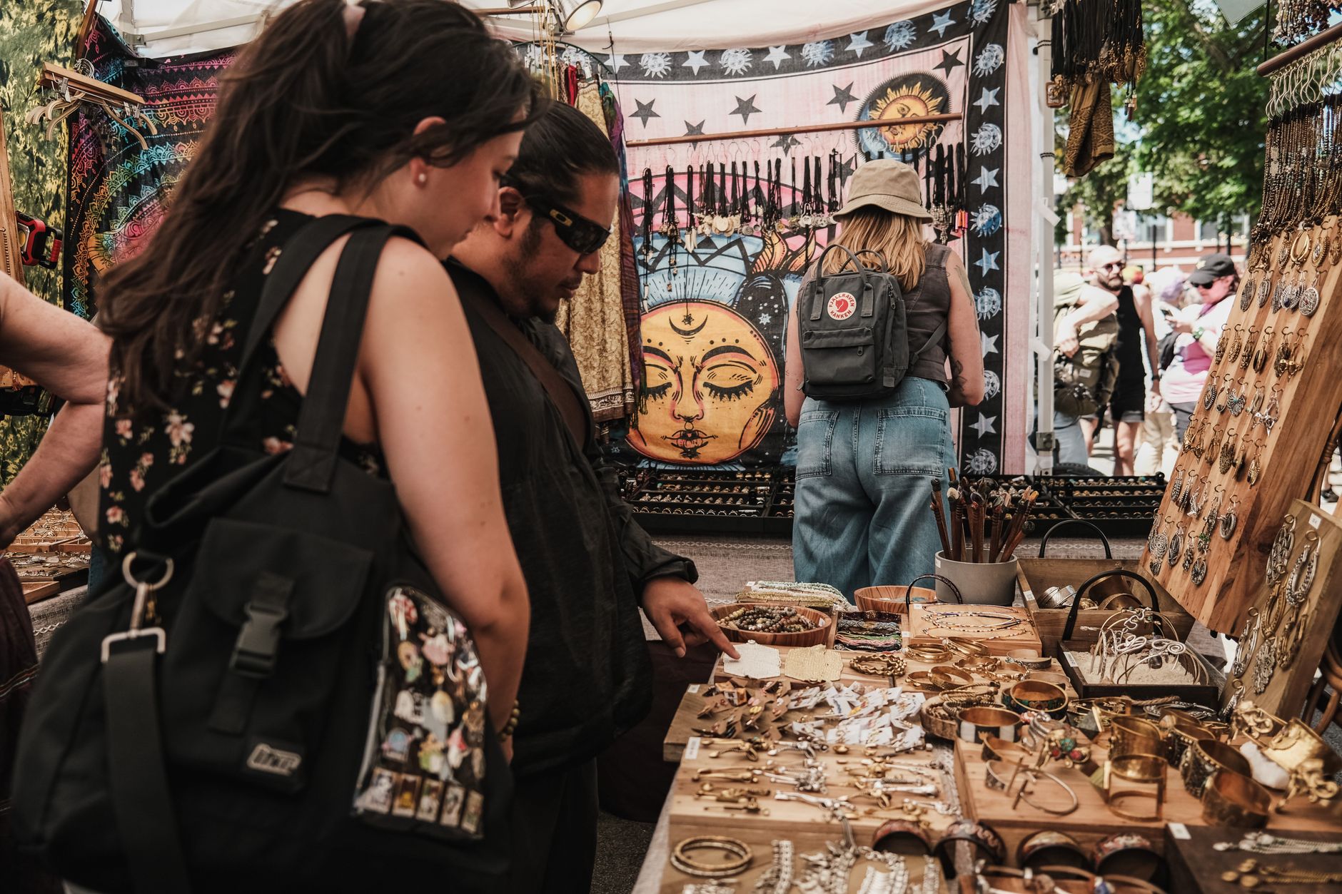 Discover unique handmade jewelry at a bustling outdoor market in Chicago.