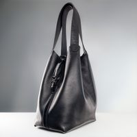 Black leather handbag studio shot — photo by José Martin Segura Benites on Pexels