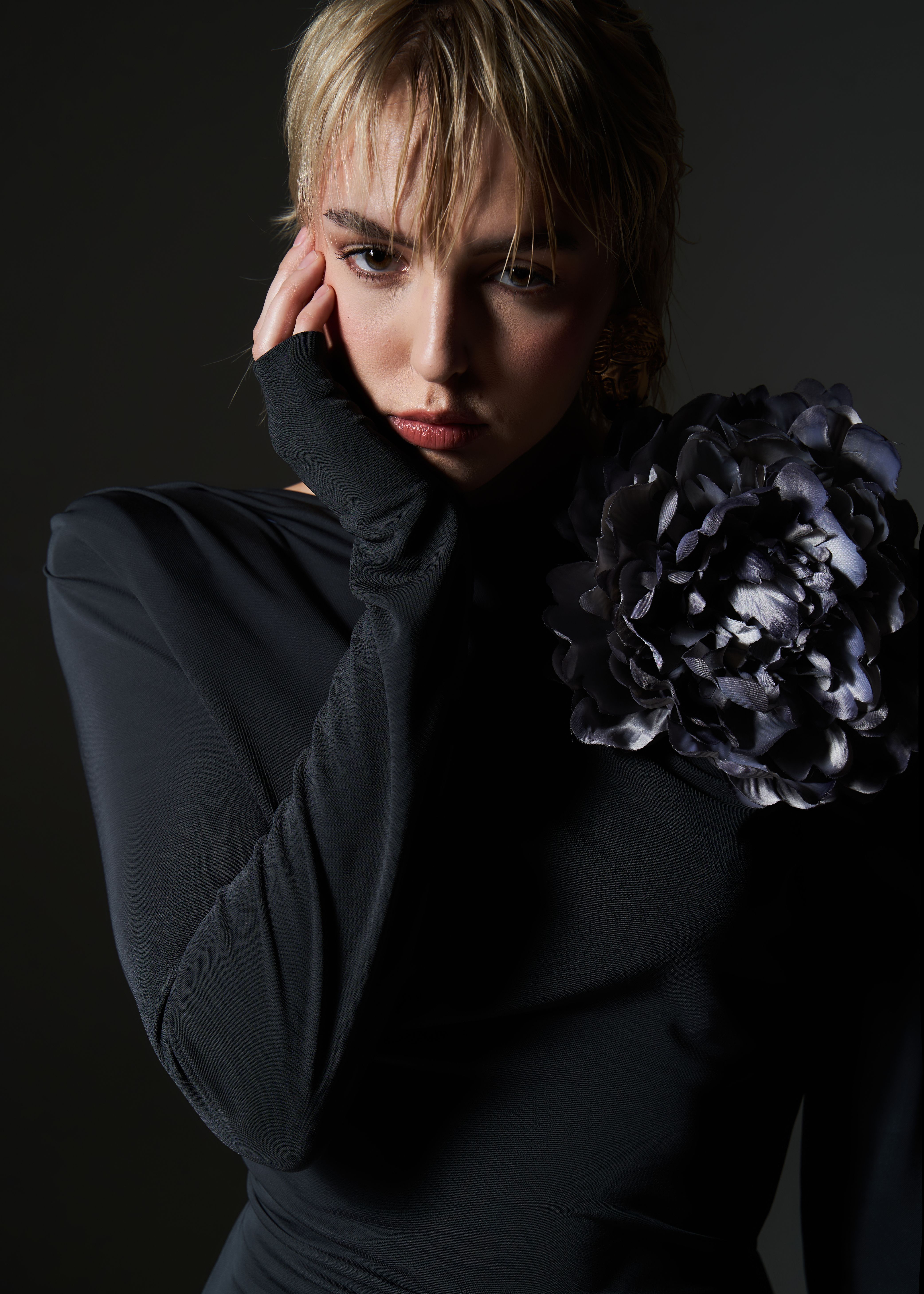 Studio Shot of a Young Woman Wearing a Black Dress · Free Stock Photo