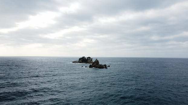Peaceful aerial view of a rocky island in the Adriatic Sea near Montenegro's coast.