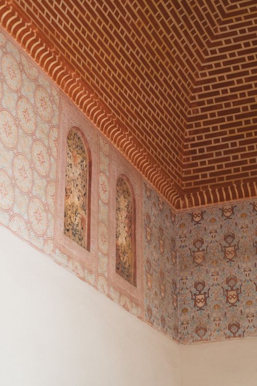 Free Stunning interior with colorful mosaic and patterned walls in a historic palace Stock Photo