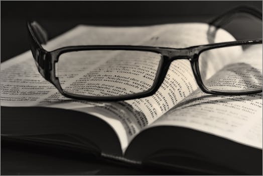 Free stock photo of black-and-white, eyewear, book, paper