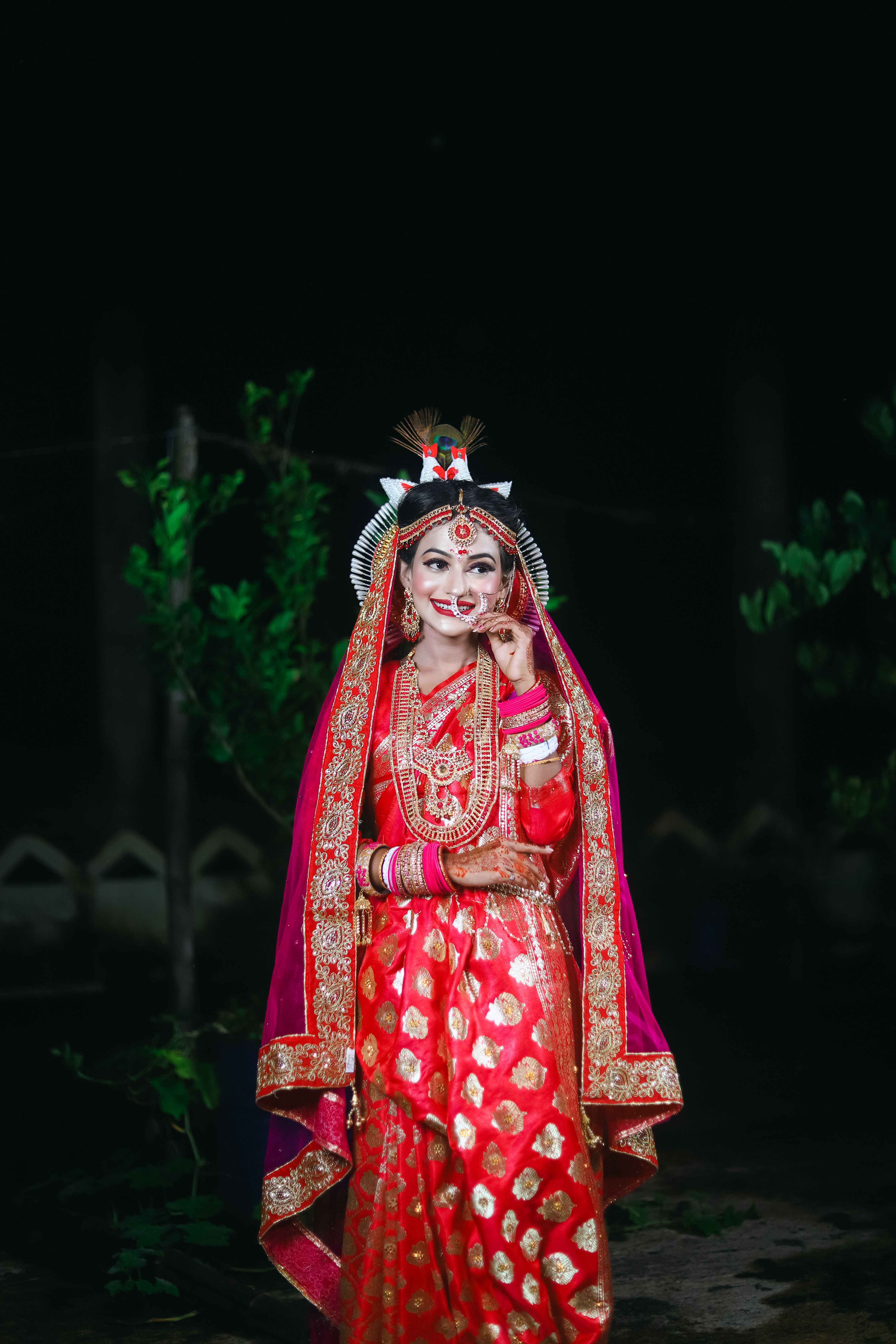 Smiling Woman in Traditional Dress and Makeup  Free Stock Photo