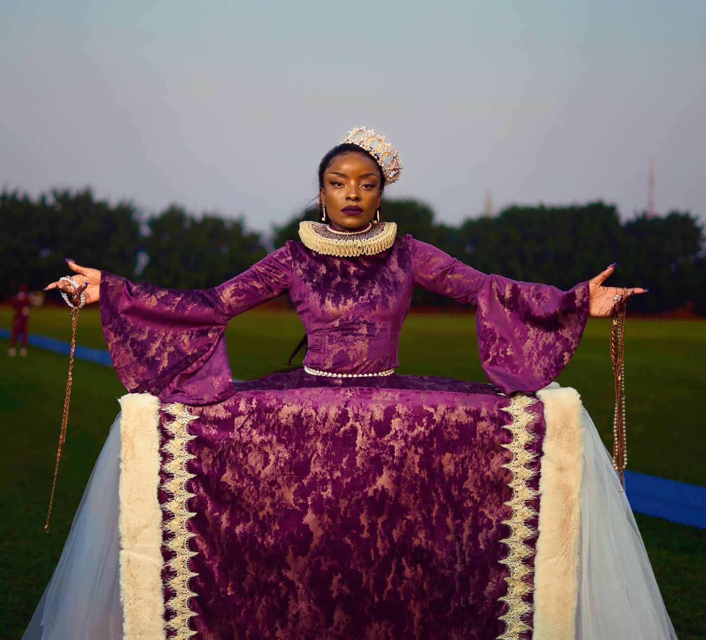 A striking portrait of a woman in Victorian-inspired fashion taken outdoors in Lusaka, Zambia.