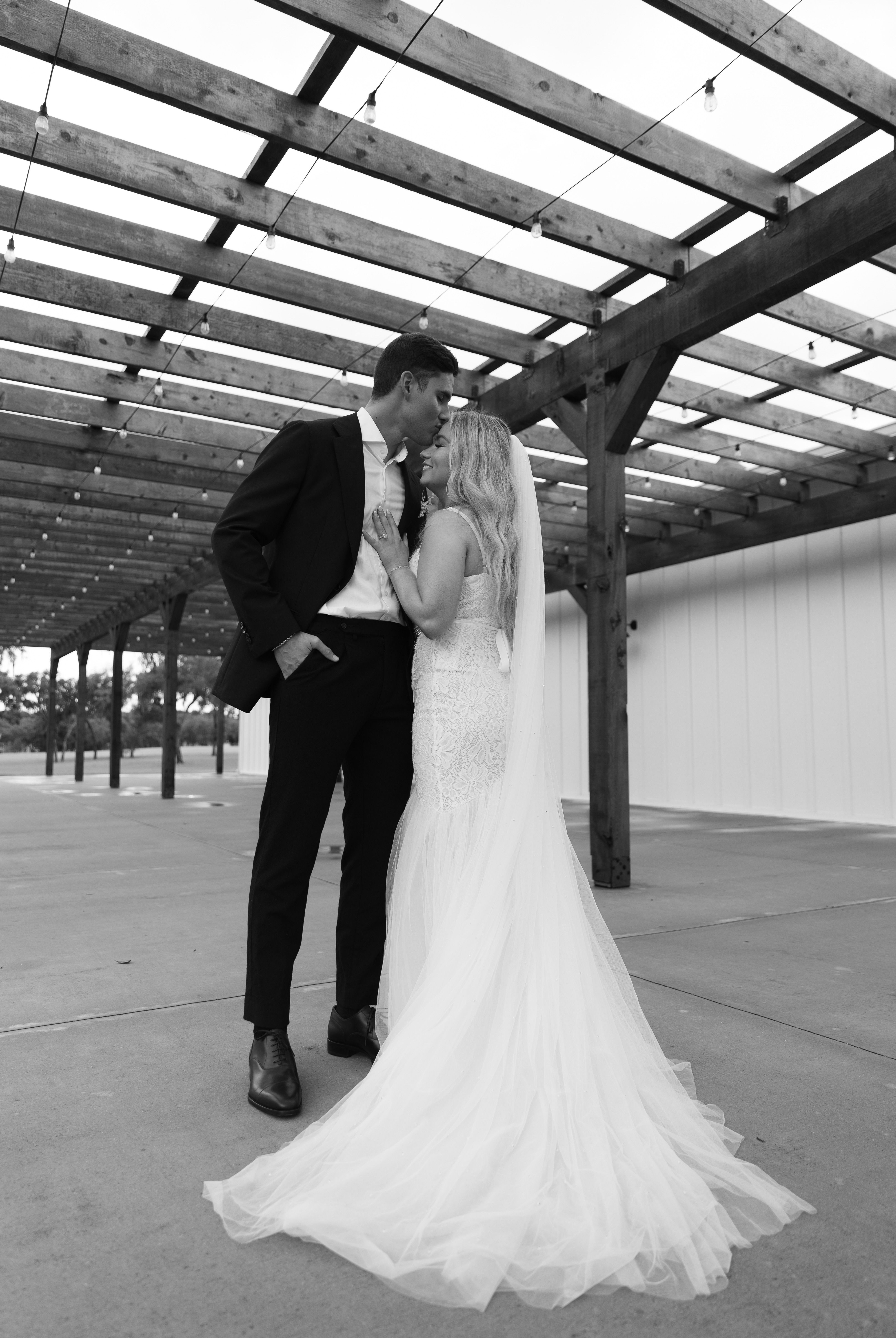 Black and White Shot of the Newlyweds Kissing · Free Stock Photo
