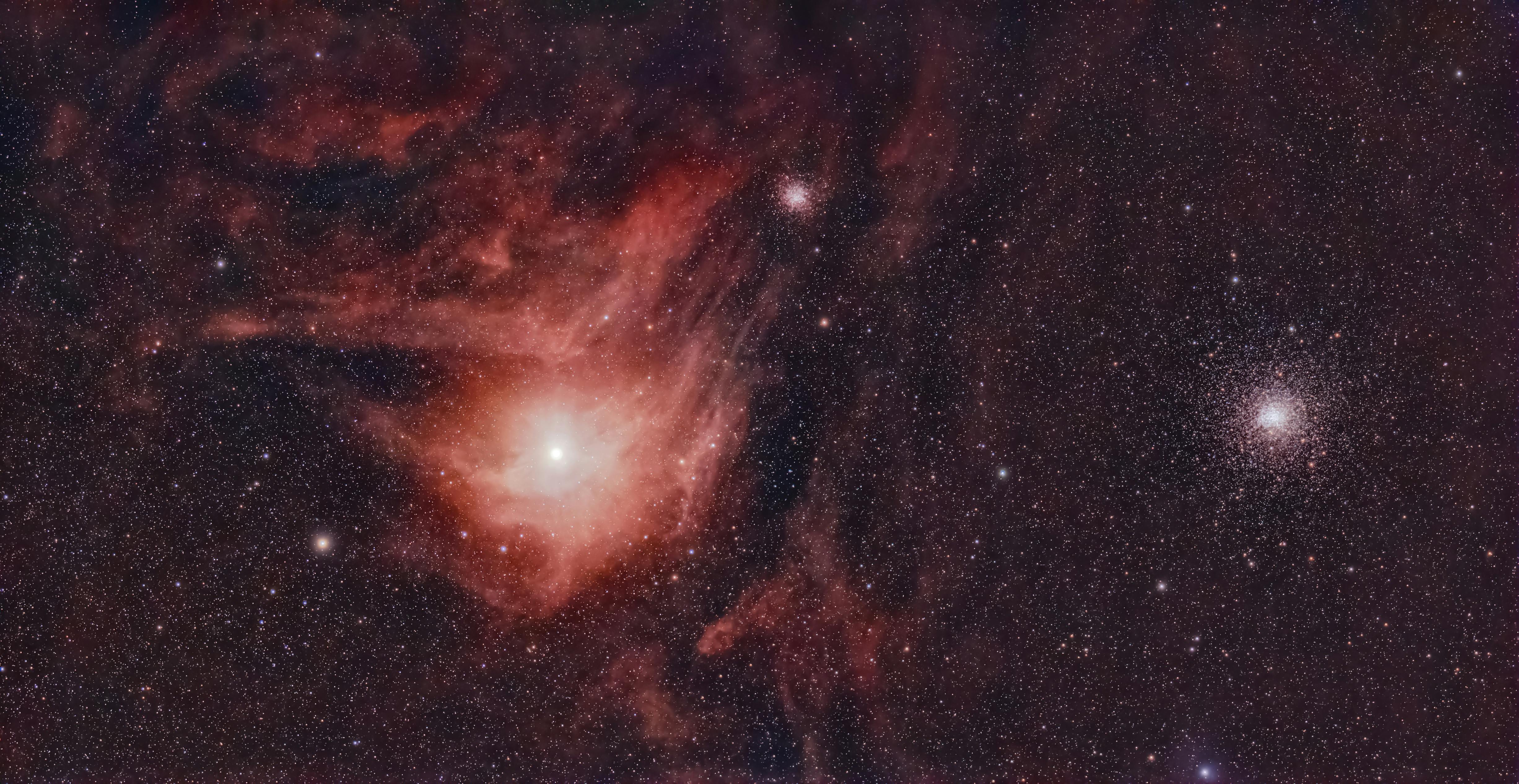 A stunning view of a nebula and star cluster in deep space, showcasing cosmic beauty.