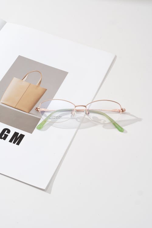 Delicate Sophistication: Titanium Eyewear on Display · Free Stock Photo