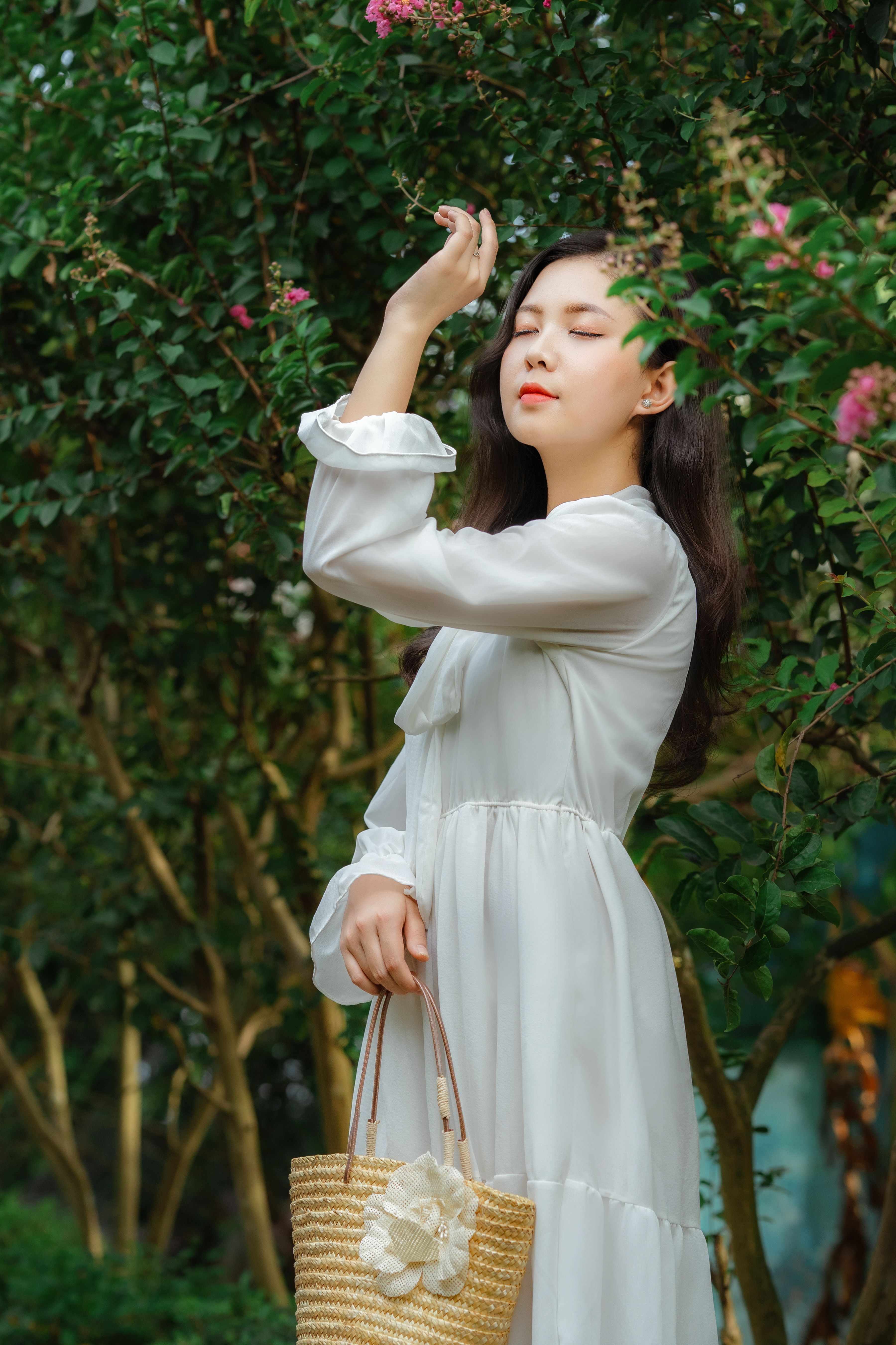 Woman in White Dress Standing with Eyes Closed · Free Stock Photo