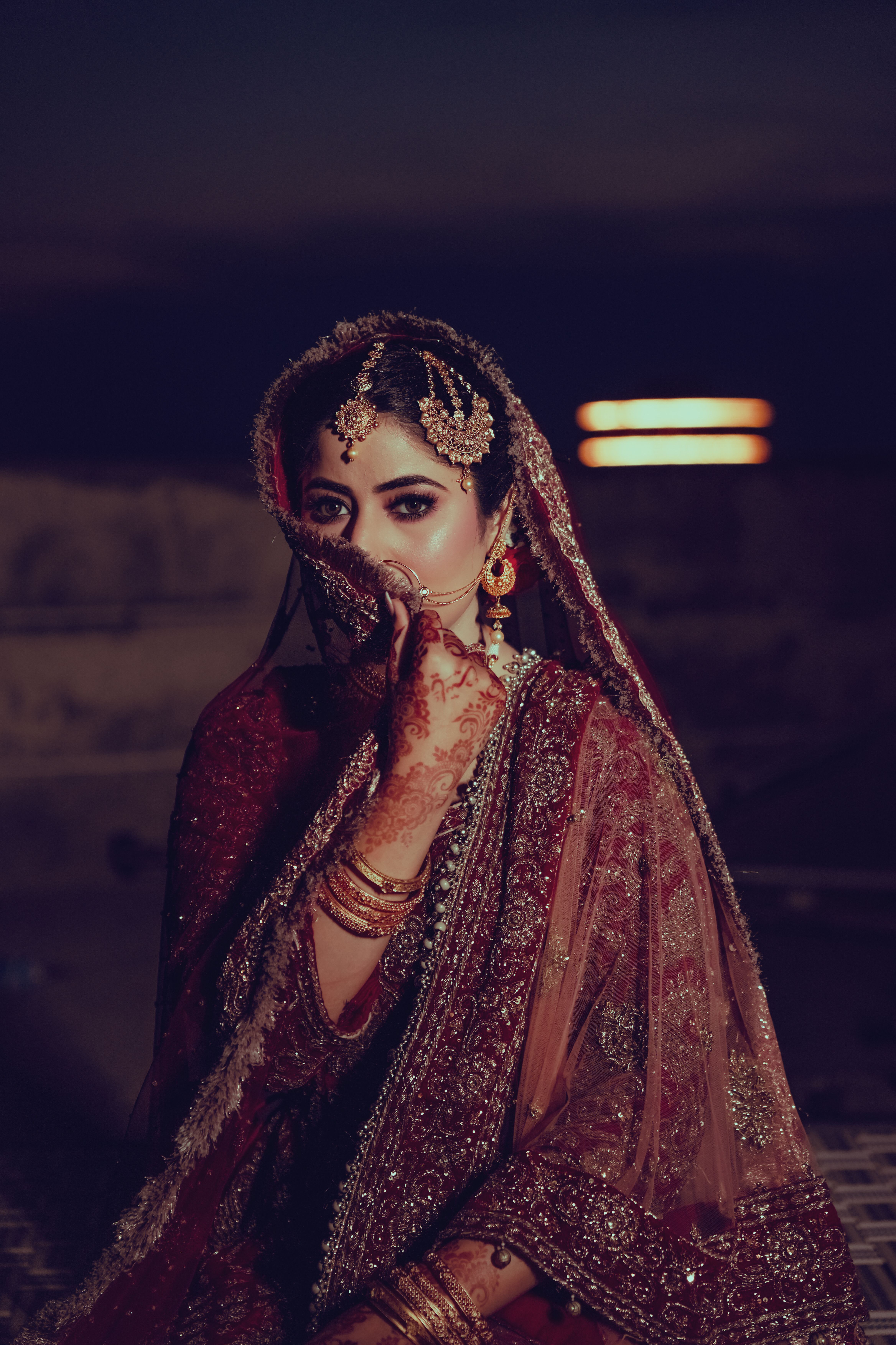 A beautiful indian bride in traditional attire · Free Stock Photo