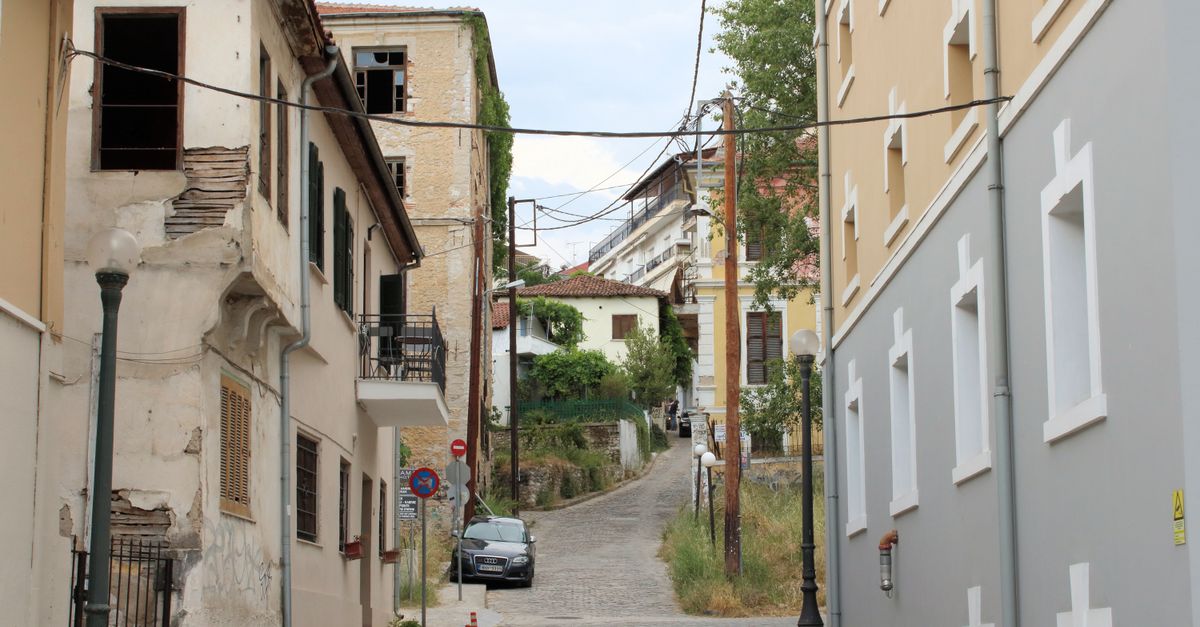 Elegant view of architectural styles and narrow streets in Kavala, Greece, showcasing historic charm.