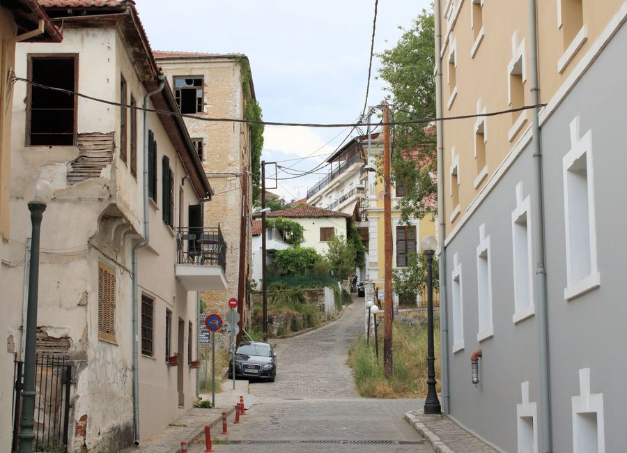 Elegant view of architectural styles and narrow streets in Kavala, Greece, showcasing historic charm.