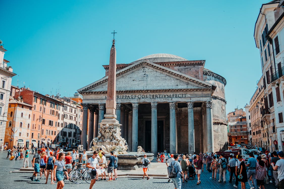 Free Photo of people walking in front of pantheon roman temple in rome, Italy Stock Photo