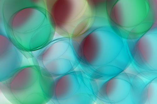 Free Vibrant abstract art featuring overlapping green and blue bubbles creating a dreamy effect. Stock Photo