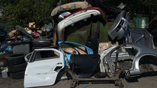 Free Car body parts in junkyard Stock Photo