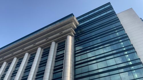 Free Modernist big glass and iron buildong Stock Photo