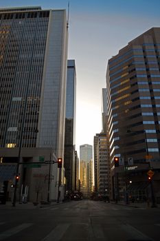 A breathtaking view of Denver's downtown skyscrapers at sunrise, highlighting urban architecture.