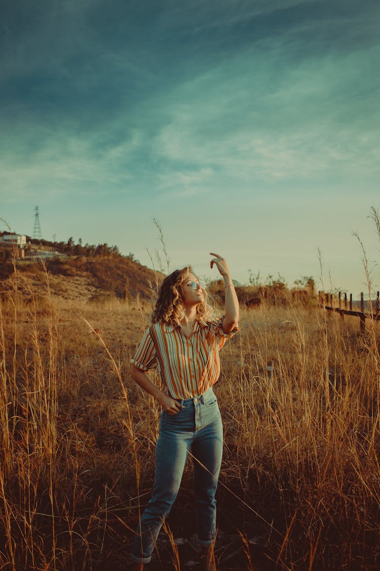 Photo Of Woman Raising Her Hand