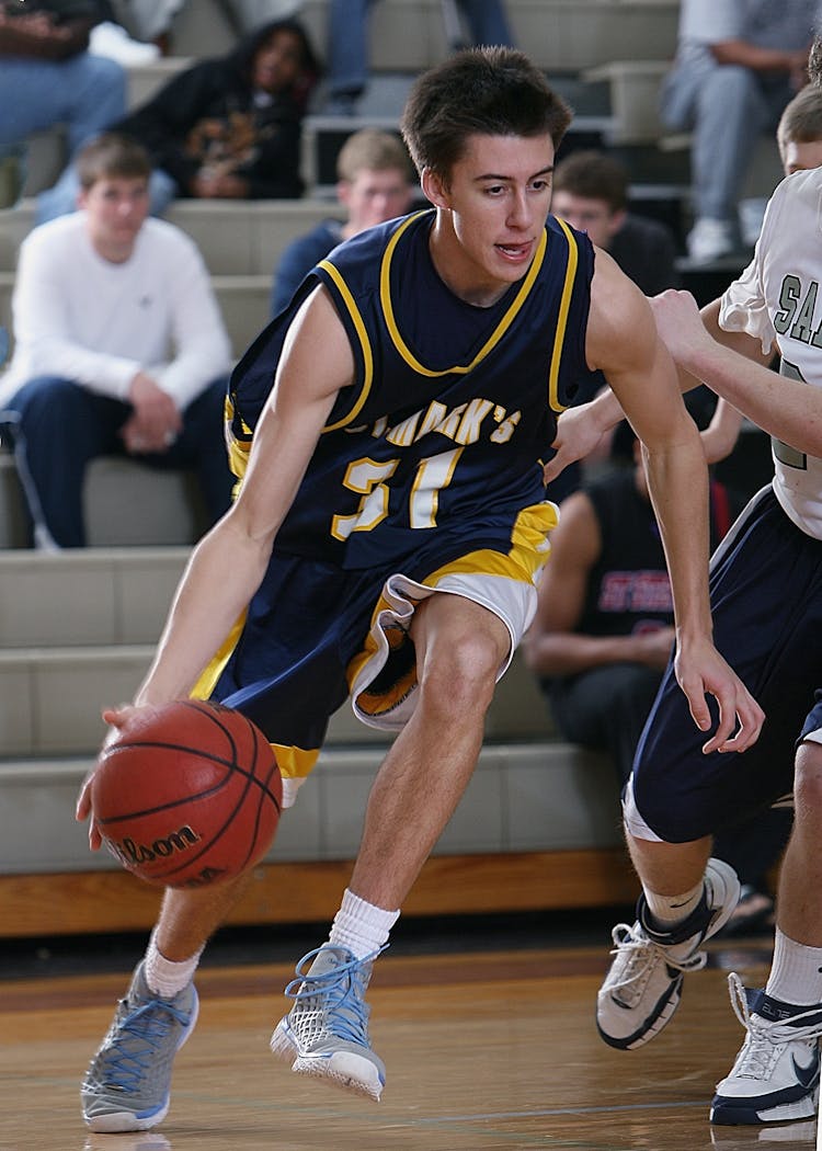 Man Playing Basketball