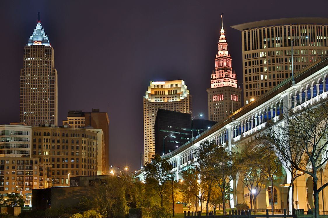 Cleveland, Ohio skyline illuminated at night with historic Terminal Tower