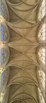 Intricate Gothic ceiling, captured in a cathedral in Blois, showcasing historic architecture.