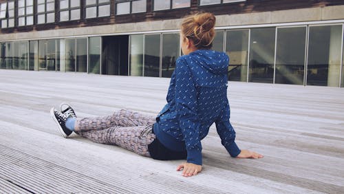 Woman Sitting on Floor