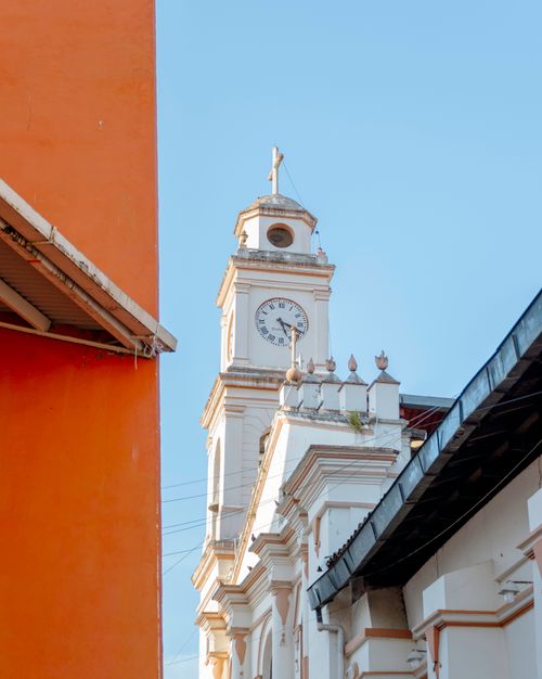 Free Explore the traditional architecture of the church clock tower in Huauchinango, Mexico. Stock Photo
