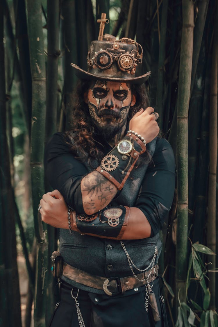 Portrait Of Man In Costume Hat And Makeup