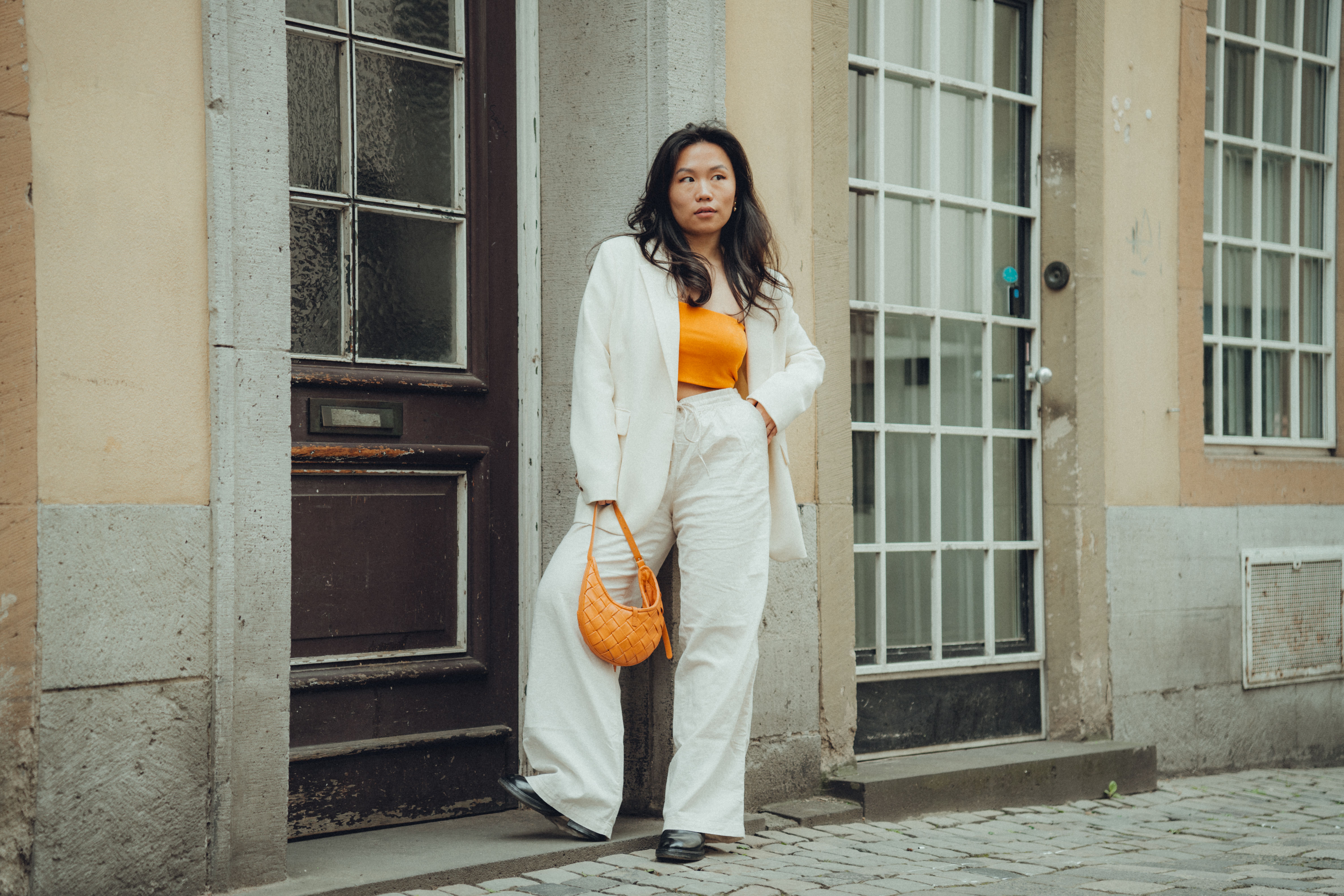 A Fashionable Woman Posing on a Street by the Building in a City · Free ...