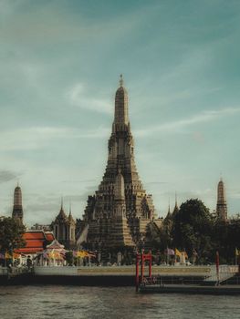 Beautiful Wat Arun temple in Bangkok, Thailand, capturing its intricate architecture at daytime.