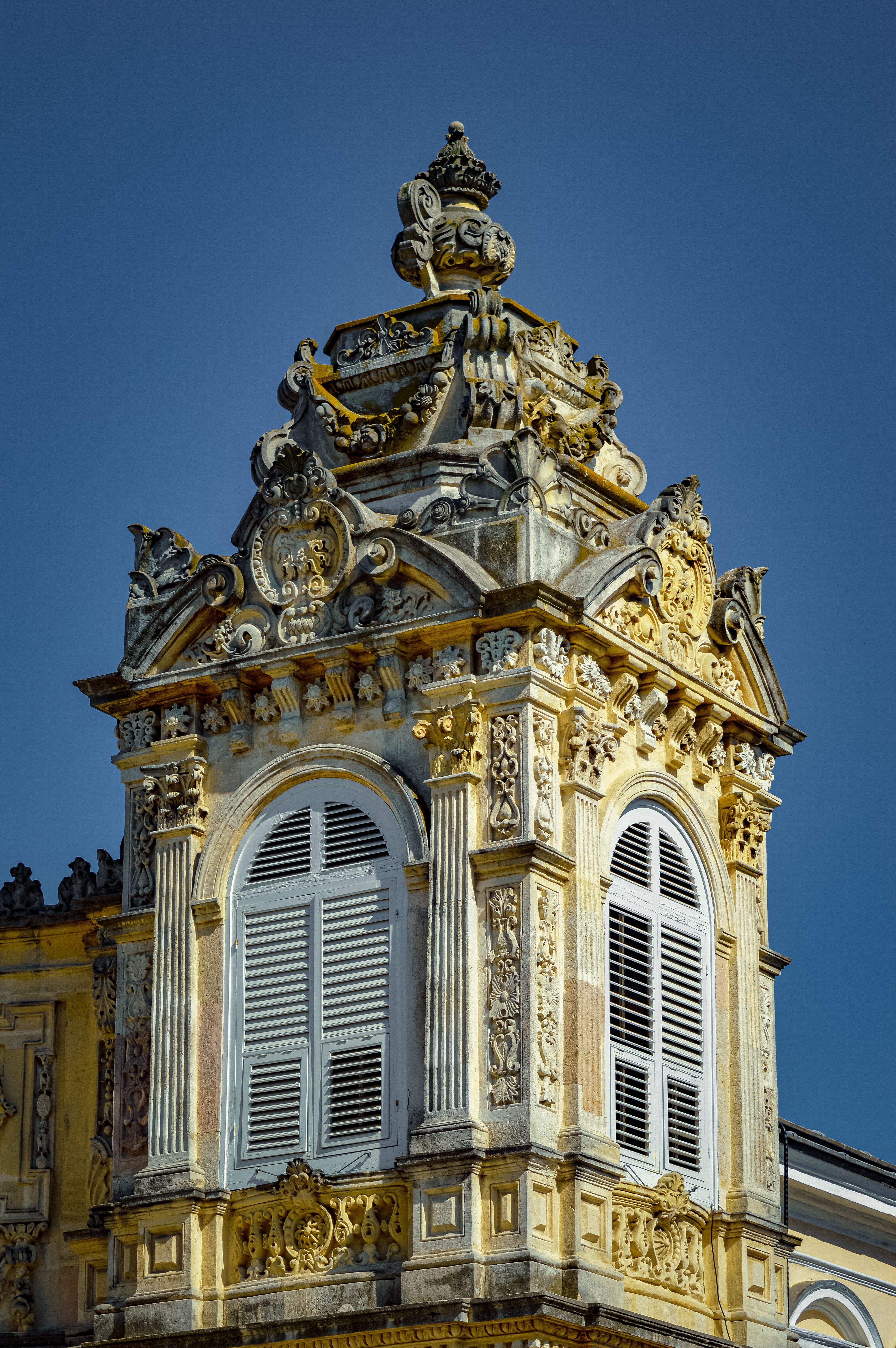 Close-up of a richly decorated tower with Baroque elements in İstanbul, Türkiye.