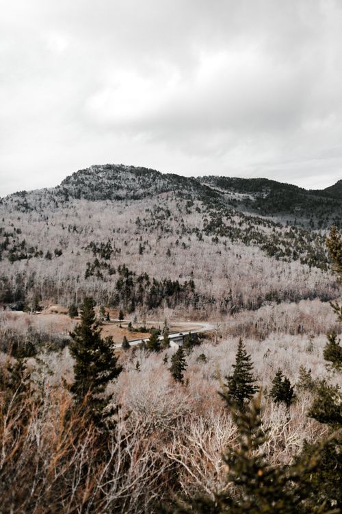 Free Beautiful mountain view in North Carolina featuring lush forests under a cloudy sky. Stock Photo